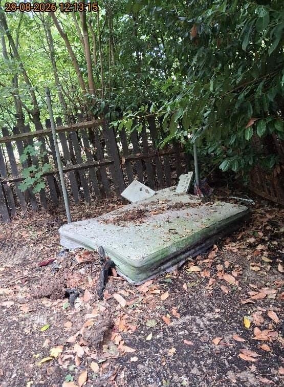 Fly-tipped mattress removal before clearance