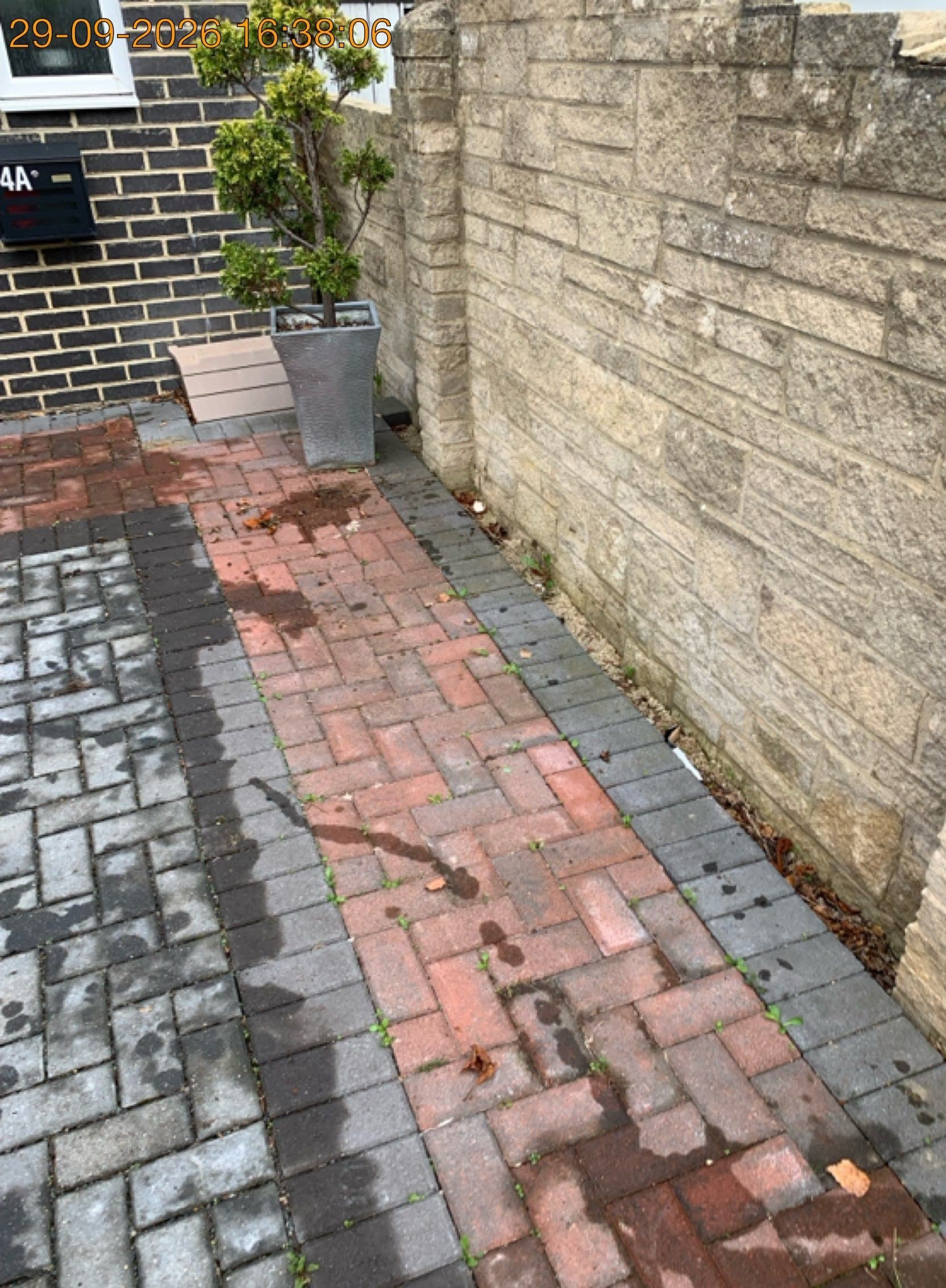 The same block-paved driveway on Rock Close, Carterton fully cleared after the old windows and builders waste were removed