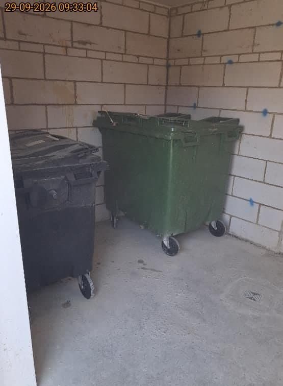 Communal bin store litter cleared, Thame after clearance