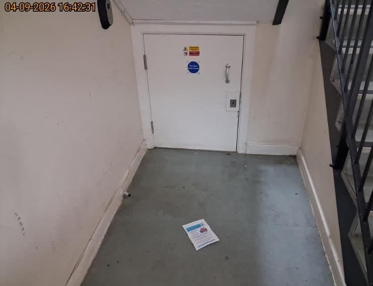 The same Watford communal stairwell cleared and tidy after removing the abandoned shopping trolley
